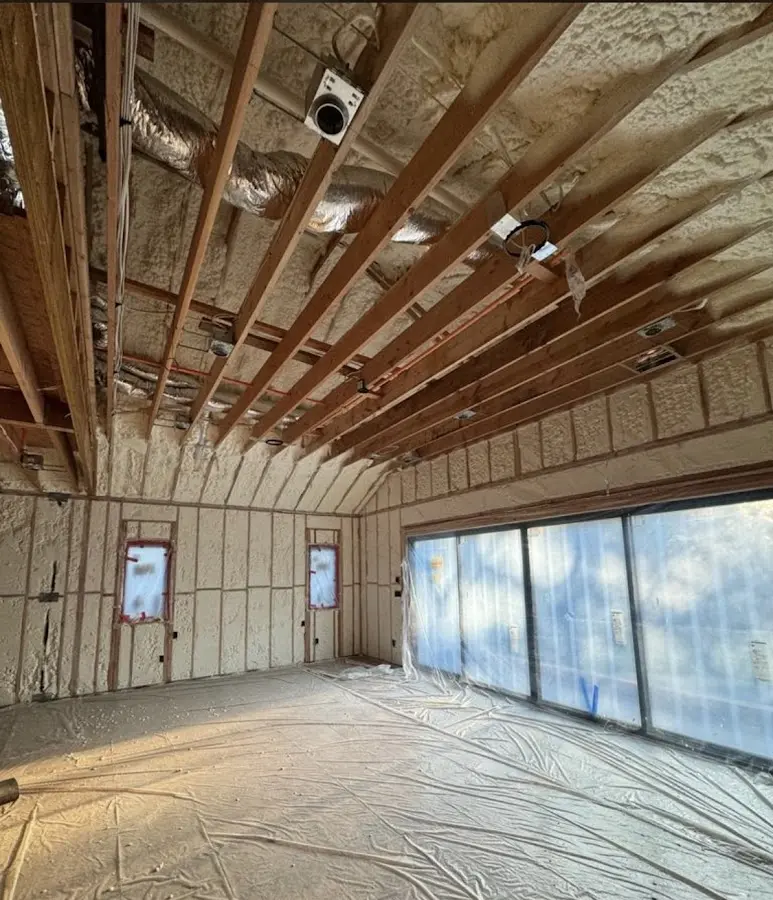 Interior walls and ceiling insulated with spray foam during new construction in Forest Grove